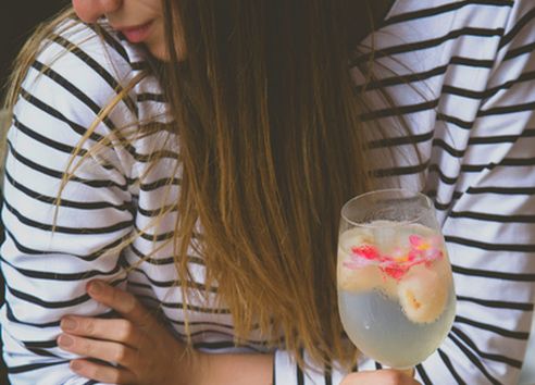 Close up of woman holding non-alcoholic drink