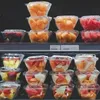 Fruit in packaging on shelf