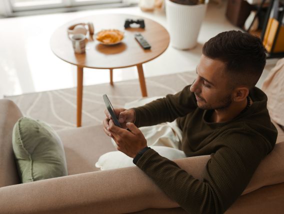 Man scrolling on phone